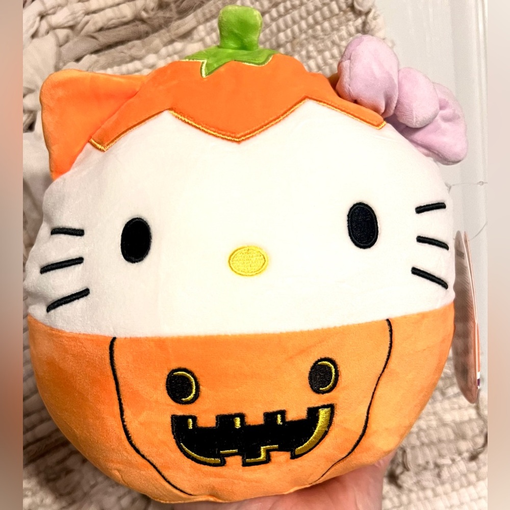 Hello Kitty Squishmallow in Orange and White pumpkin costume